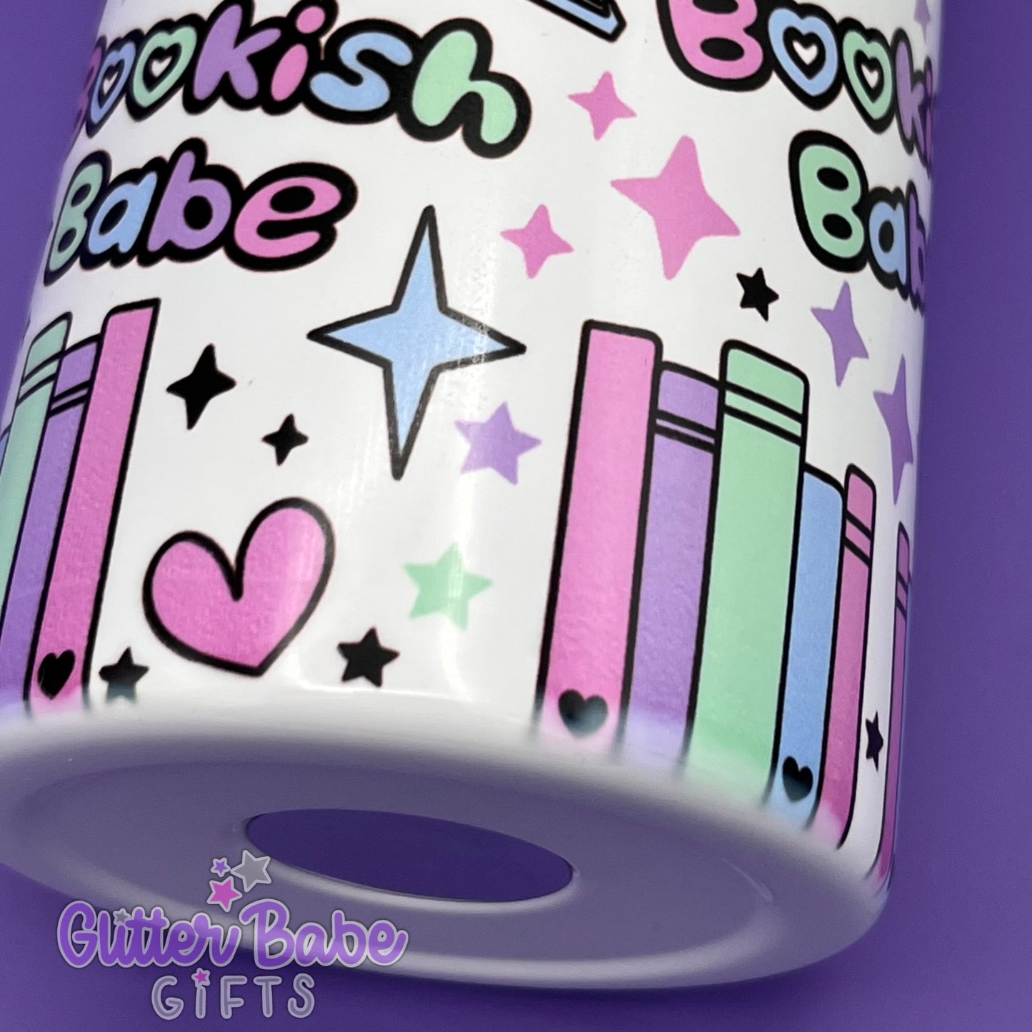 close up of faded print on tumbler edge at base