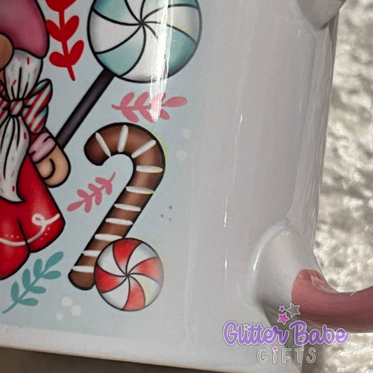close up of a faded candy swirl print on a mug near handle