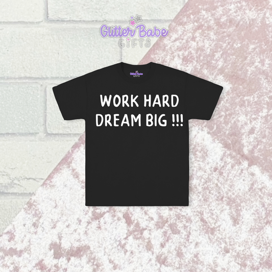 Black t-shirt with white writing on a pink and brick background