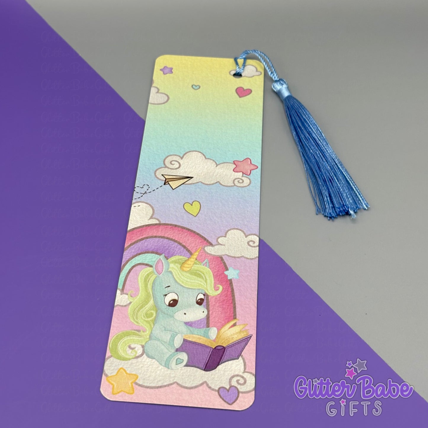 Blue and green Unicorn-themed bookmark with tassel on a gradient background, featuring 'Glitter Babe Gifts' branding.