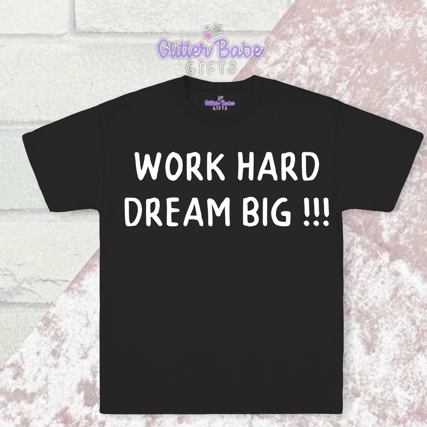 Black t-shirt with white writing on pink and white background