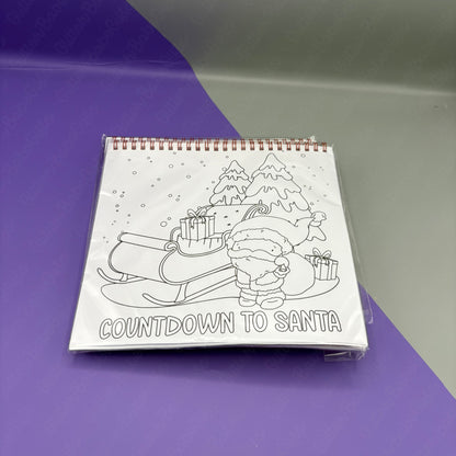 Colouring book titled 'Countdown to Santa' on a purple and gray gradient background