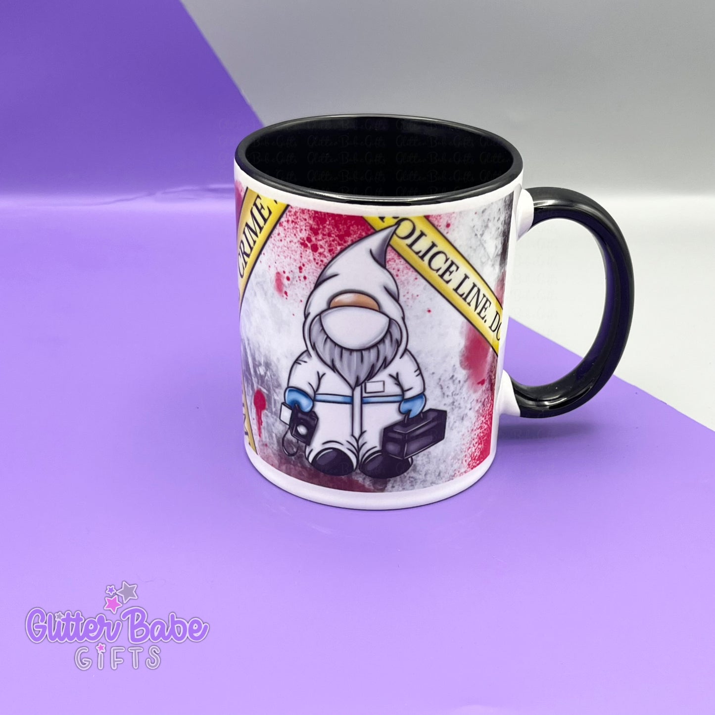 White mug with black handle and inner with image of a gnome dressed as a Crime Scene Investigator