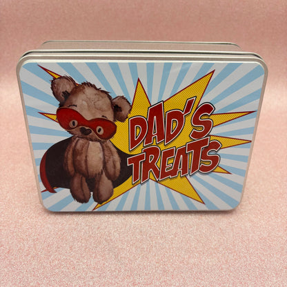 Tin box with a teddy bear and 'Dad's Treats' text on a pink background