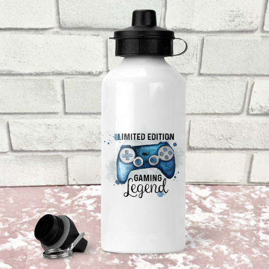 White water bottle with a blue gaming-themed design on a white brick background