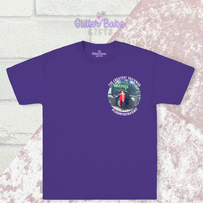 A purple t-shirt with  chest image and writing around it