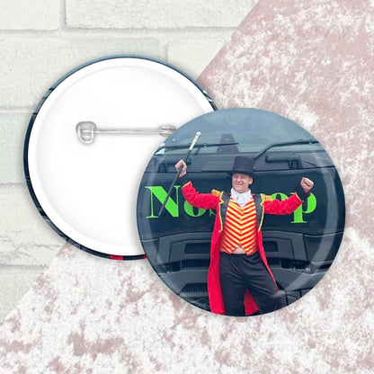 image shows a button badge front and back image with a photo of Jason Truckboy wearing a Greatest Showman Costume on the front face of badge