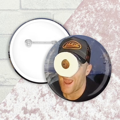 Image shows a button badge front and back image with an image of Jason Truckboy pretending to be a minion with toilet roll on the front face of badge