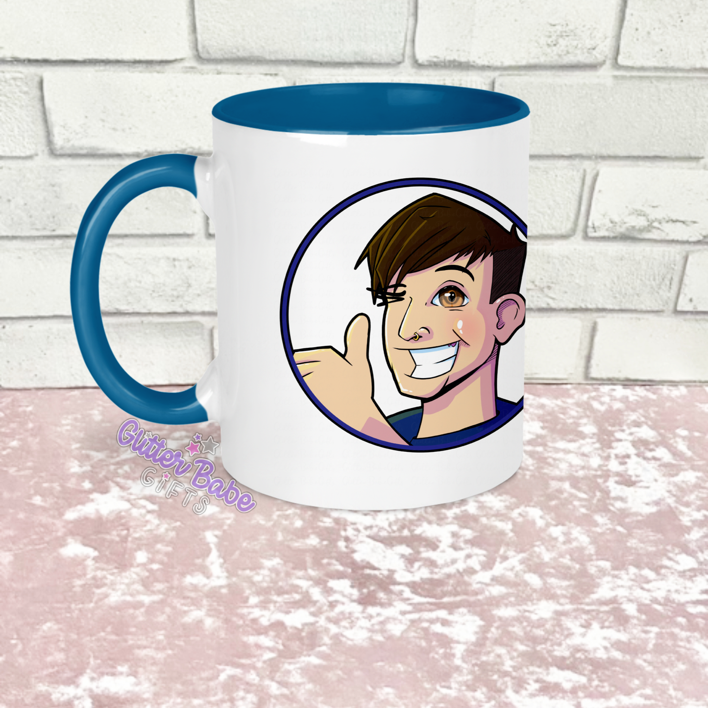 a white mug with light blue handle and inside with image on against a white and pink background