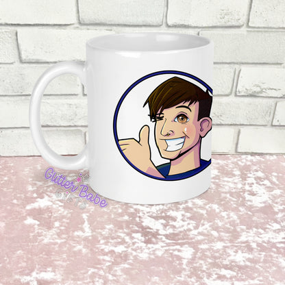 a white mug with image on against a white and pink background