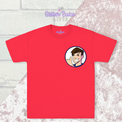 Red t-shirt with cartoon logo on left chest laying on pink and white background