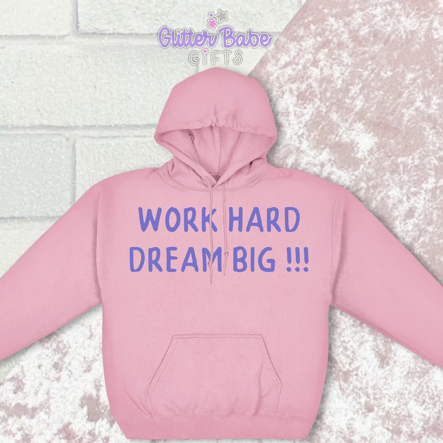 pink hoodie with purple writing on pink and white background