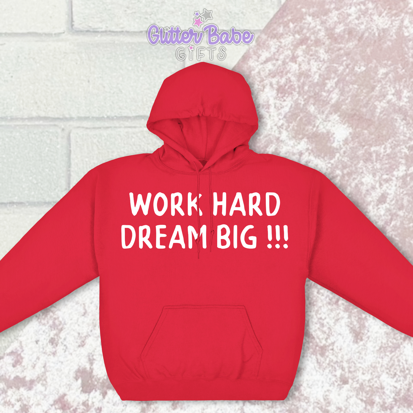 red hoodie with white writing on pink and white background