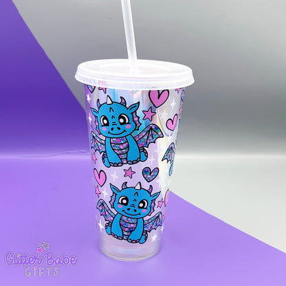 Opal coloured tumbler with blue dragon with rainbow scales, Pink hearts and white and pink stars design on a purple and grey backdrop