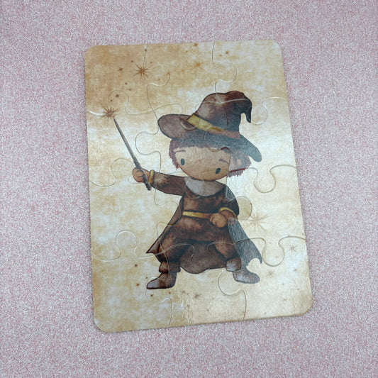 Jigsaw puzzle with a character in a wizard costume on a textured surface