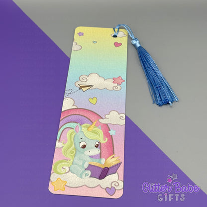 Blue and green Unicorn-themed bookmark with tassel on a gradient background, featuring 'Glitter Babe Gifts' branding.