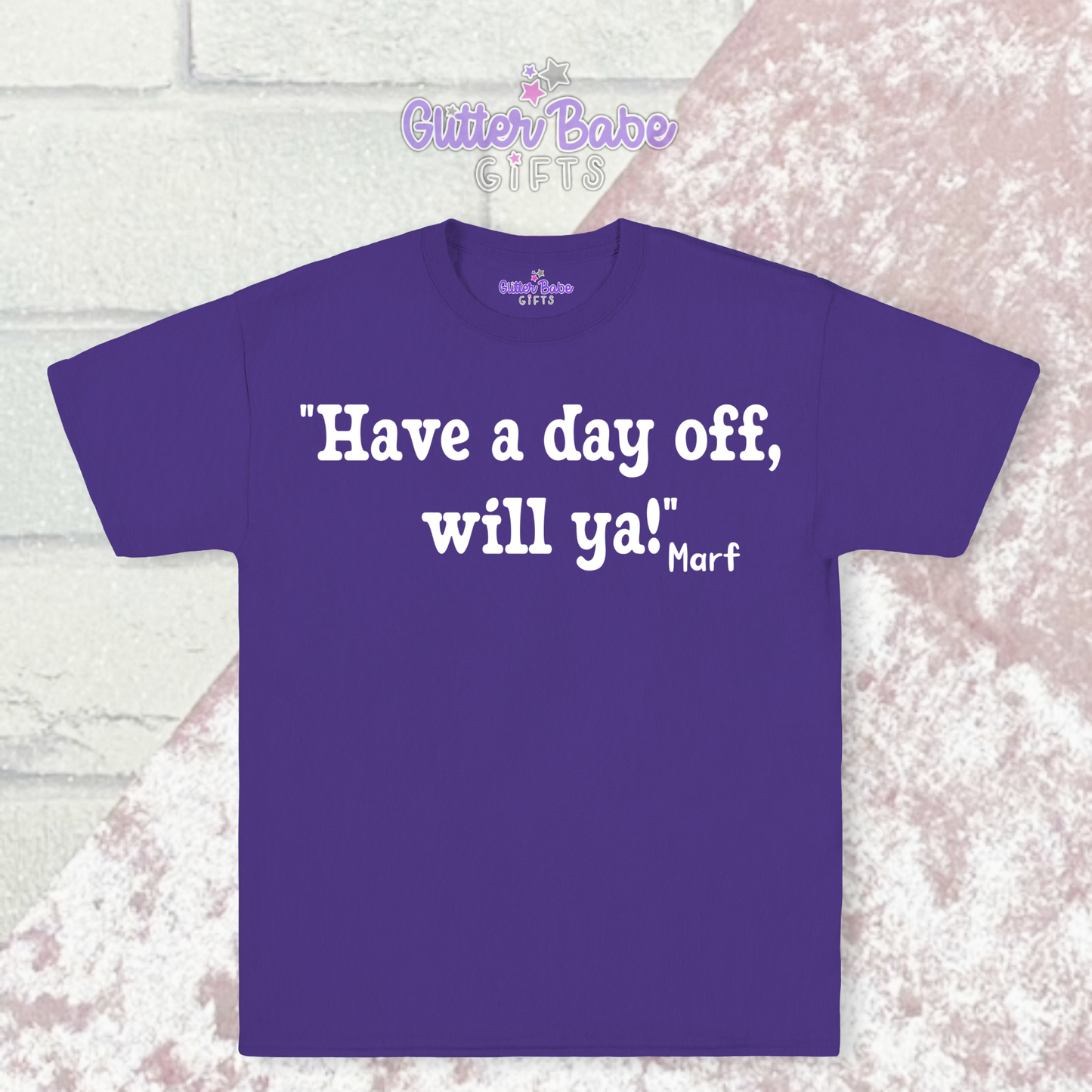 purple t-shirt with white writing on a pink and white background