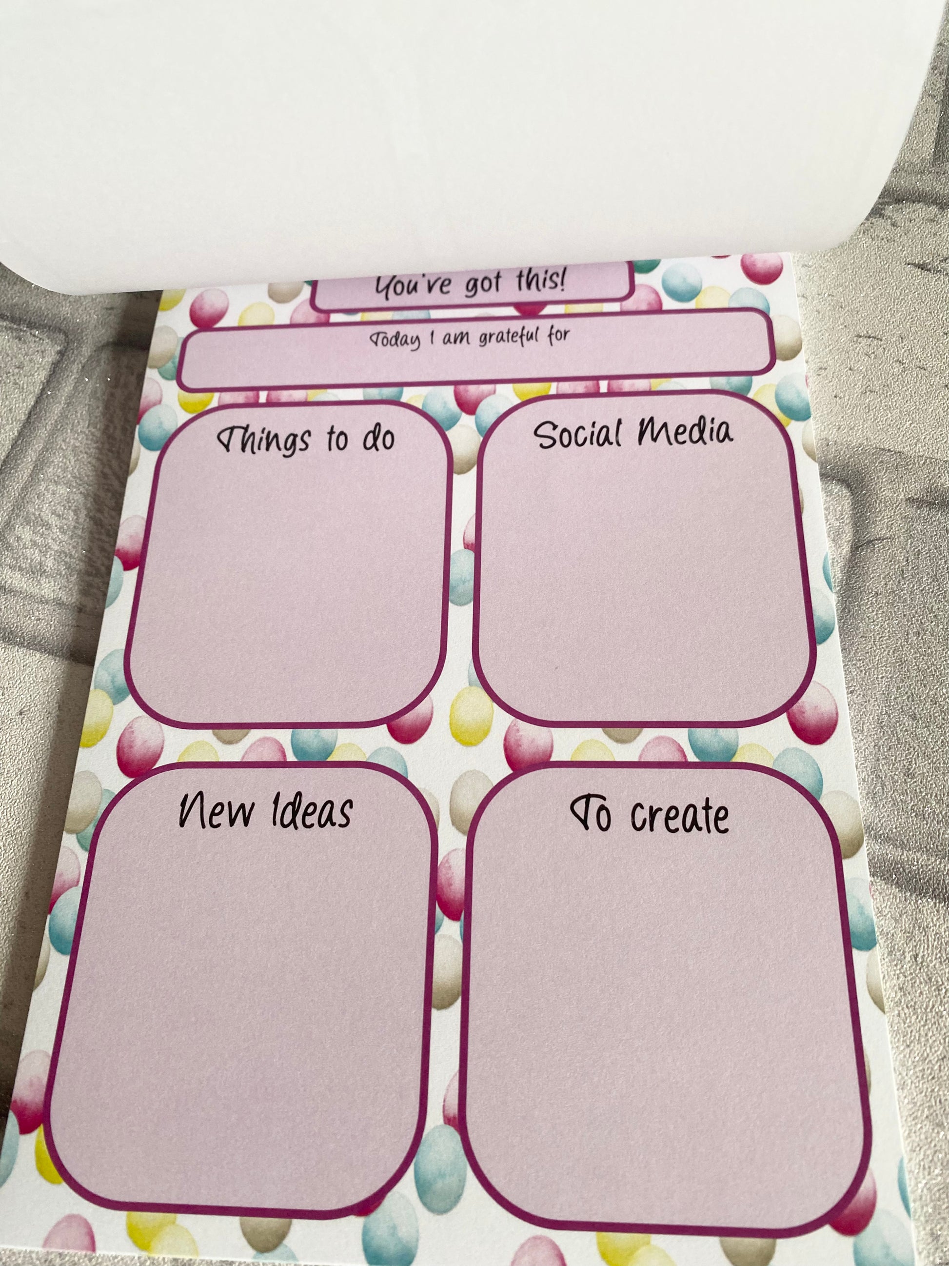 open desk planner with colourful pattern 